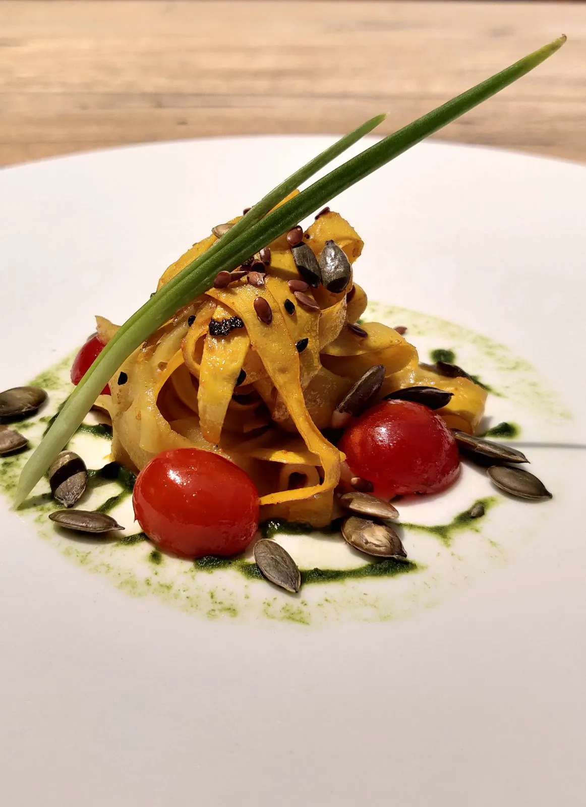 Zucchini linguini with sunflower seed pesto, toasted nigella & flax seeds